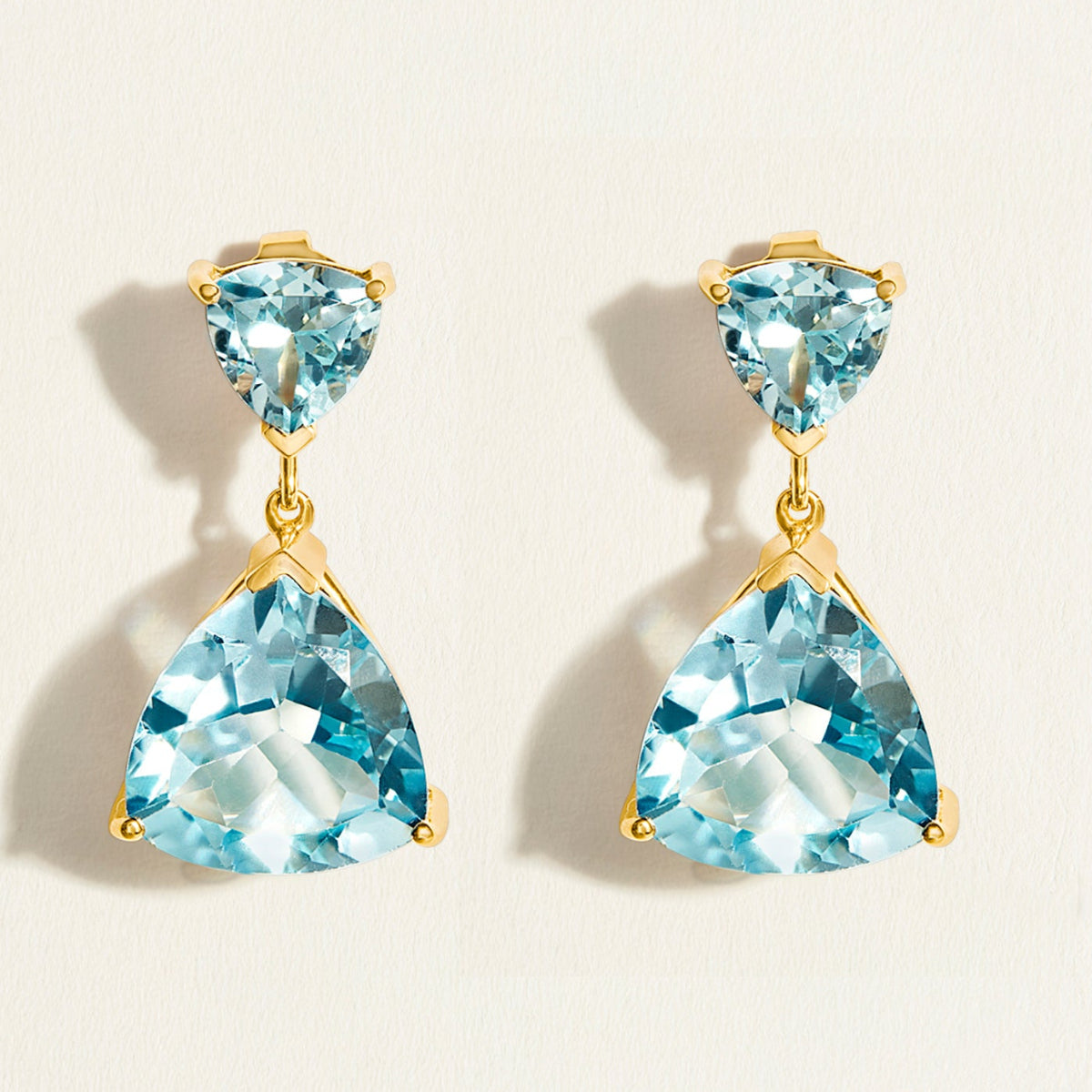 double trillion drop earrings  in 22 carats in swiss blue topaz set in 14k gold