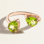 Rose gold toi et moi open ring with pear green peridot gemstones