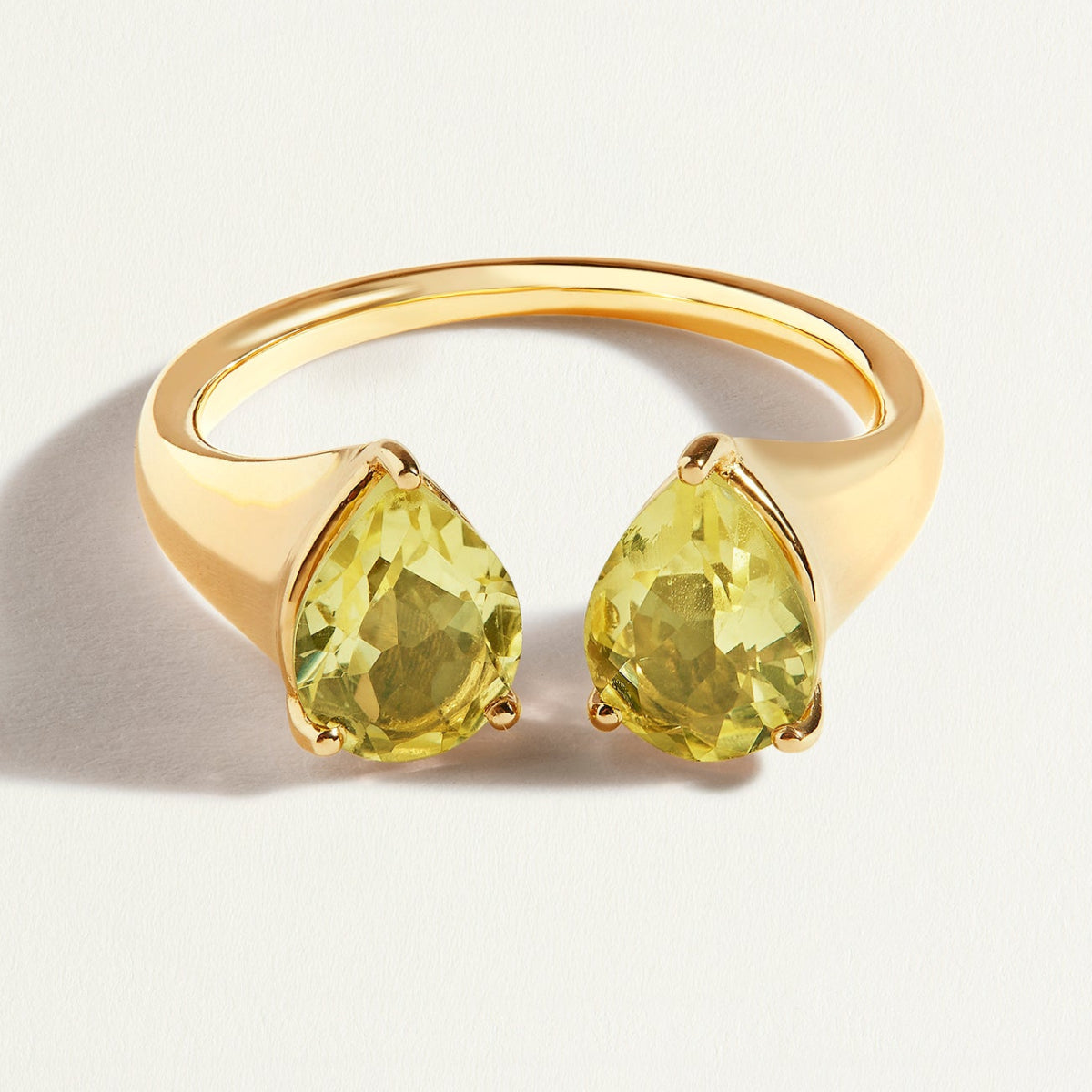 Gold signet open ring with two pear-shaped yellow lemon quartz gemstones