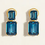 Statement emerald-cut London blue topaz double drops feature in this red carpet cocktail earrings in 14k gold. 