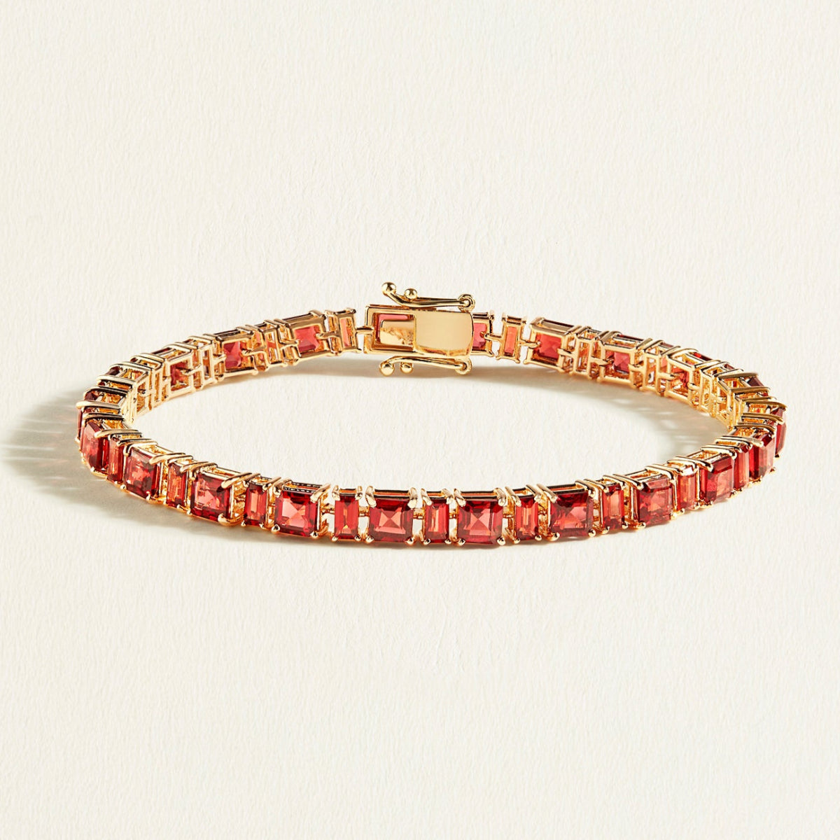 Deep red 13 carats garnets in alternating Asscher and baguette cuts in art deco style in gold 14k 18k 