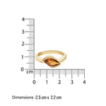 Gold ring with a  brown gemstone size measurement on a white background