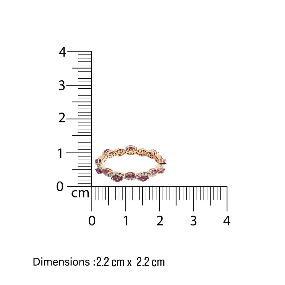 sleek eternity Ring with diamond and amethyst gemstones in wave pattern  next to a ruler on a white background