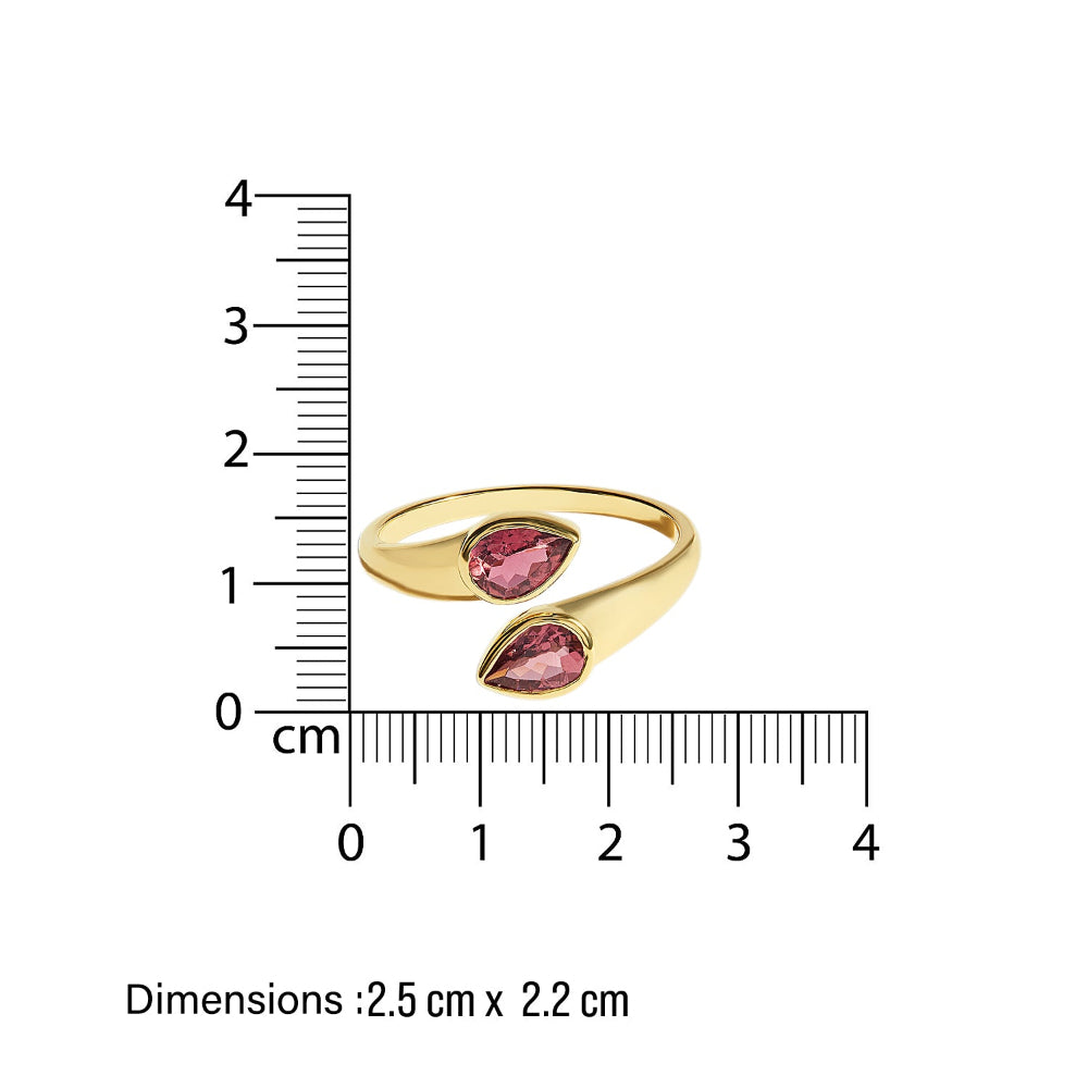 Gold ti et moi ring with pink tourmaline gemstones next to a ruler showing dimensions on a white background