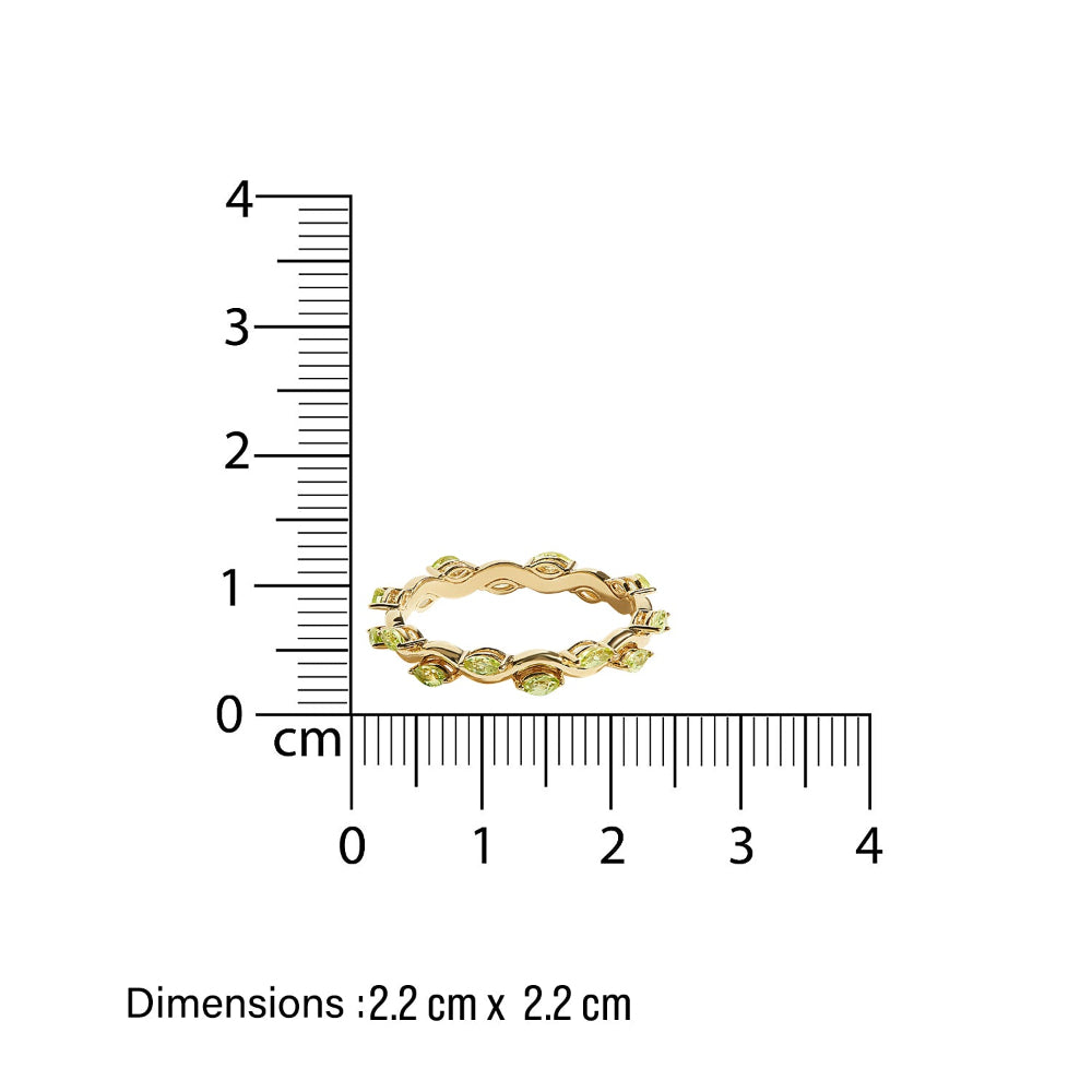 Gold thin eternity ring with leaf design green peridot next to a ruler showing its dimensions on a white background