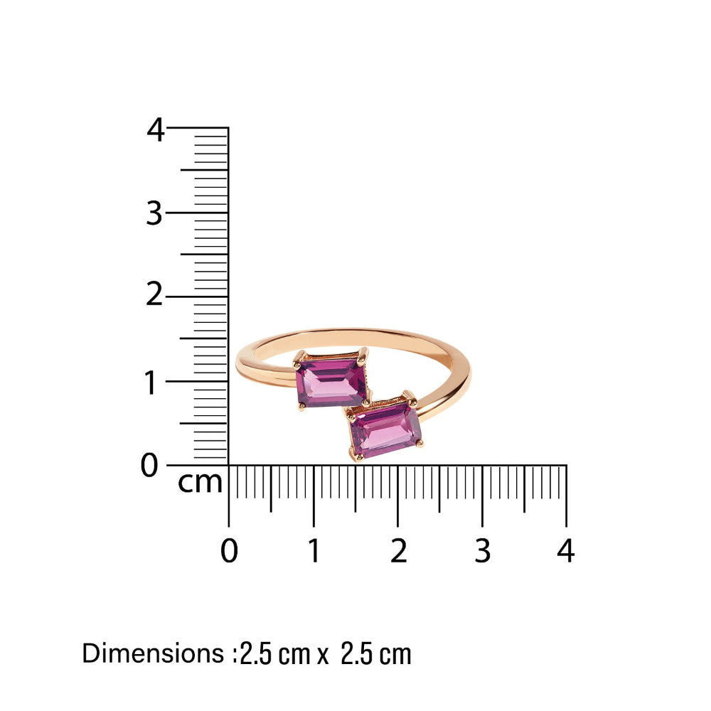 Gold ring with pink rhodolites gemstones toi et moi ring next to a ruler showing dimensions