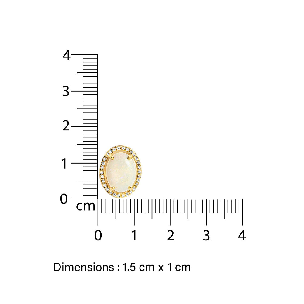 Gold pendant with a white Australian opal  and diamond halo measurement against a ruler on a white background